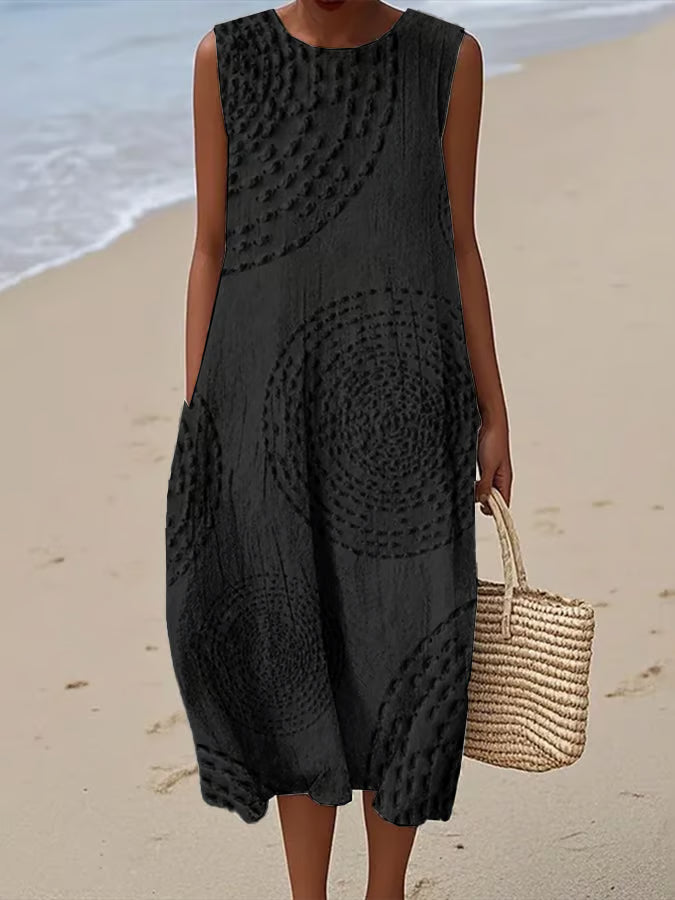 MAELLE | LONG SLEEVELESS DRESS WITH TEXTURED PATTERN