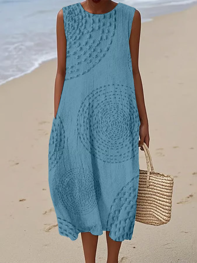 MAELLE | LONG SLEEVELESS DRESS WITH TEXTURED PATTERN